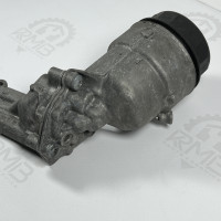 Корпус масляного фильтра на Mercedes 3.0 OM642 W164 W212 W204 A6421800010 